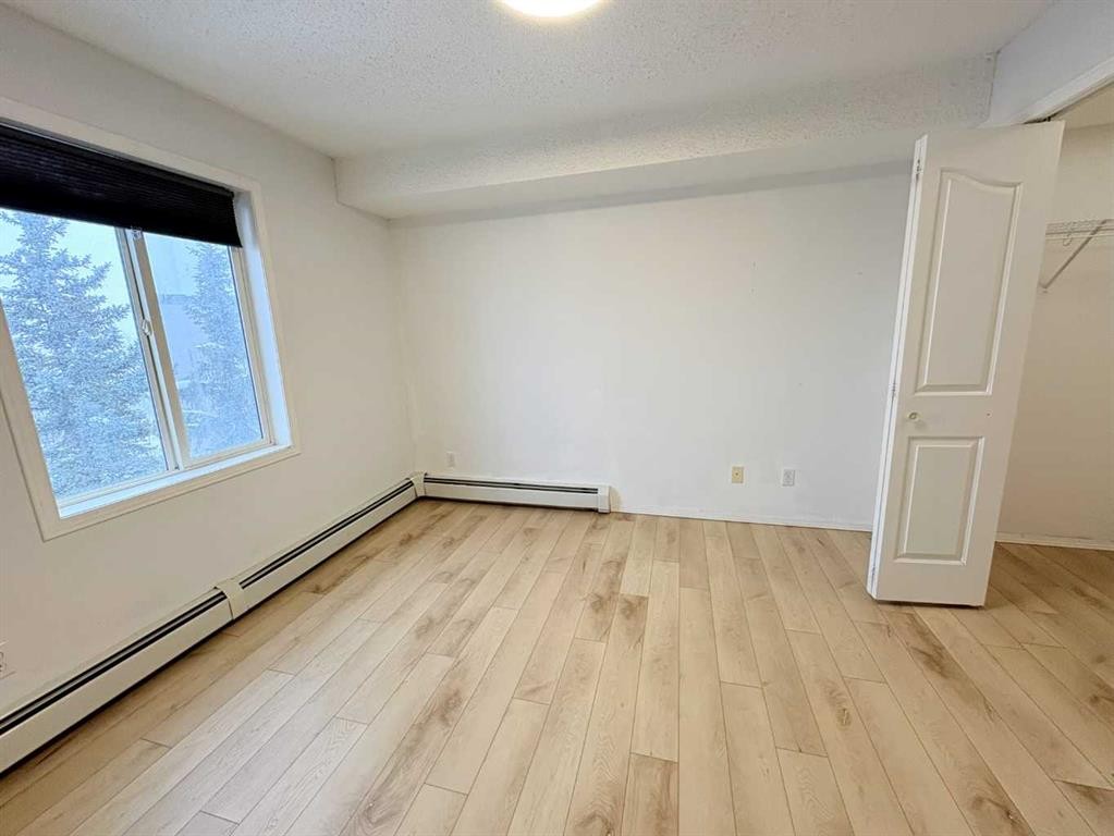 #418-4000 Somervale Court Sw, Calgary, AB - Indoor Photo Showing Other Room