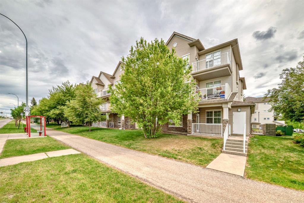 209-1000 Applevillage Court Se, Calgary, AB - Outdoor With Balcony With Facade