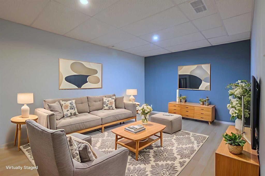 322 Country Village Cape Ne, Calgary, AB - Indoor Photo Showing Living Room