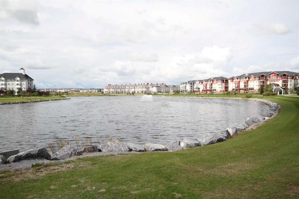 322 Country Village Cape Ne, Calgary, AB - Outdoor With Body Of Water With View