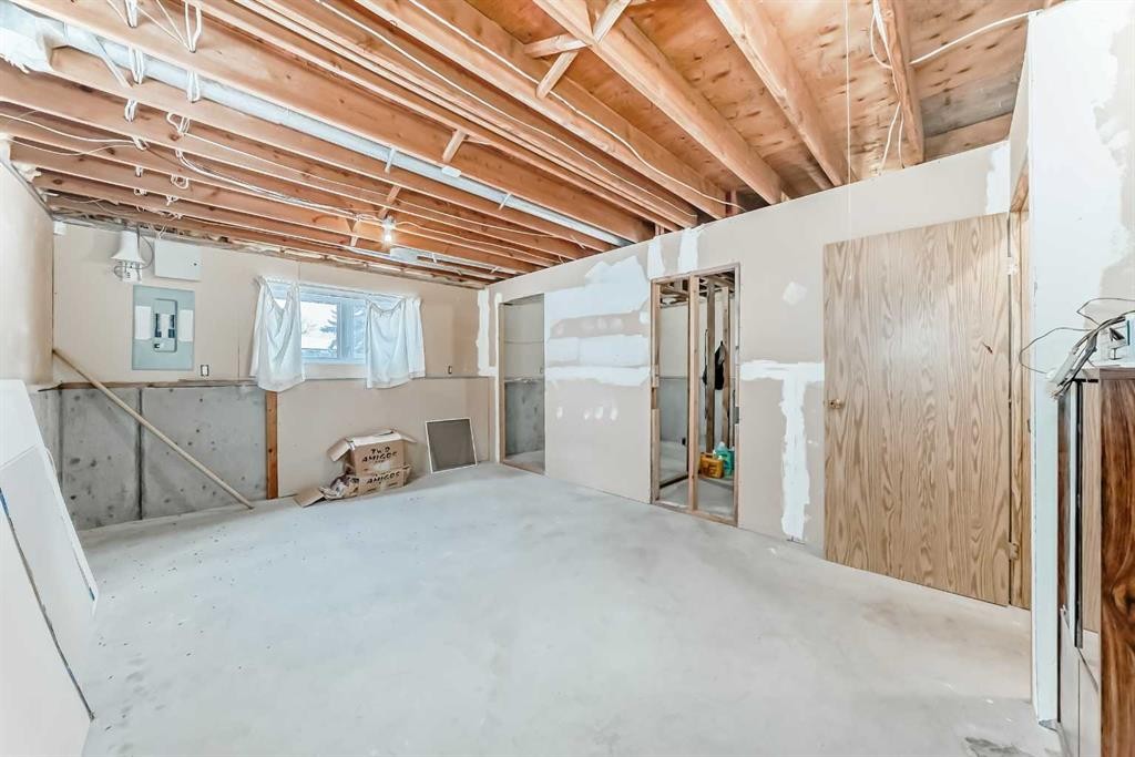 220 Haskayne Avenue, Gleichen, AB - Indoor Photo Showing Basement