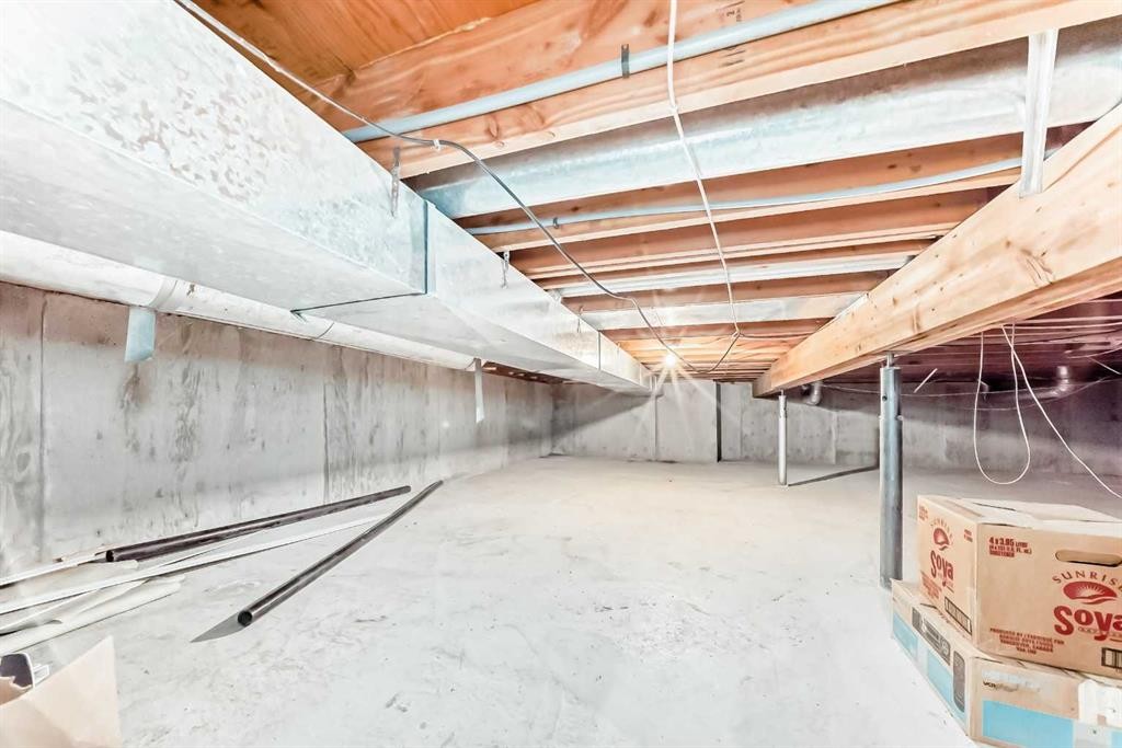 220 Haskayne Avenue, Gleichen, AB - Indoor Photo Showing Basement