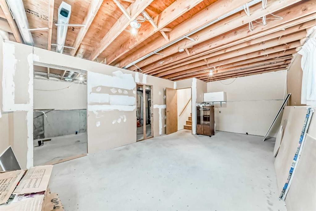 220 Haskayne Avenue, Gleichen, AB - Indoor Photo Showing Basement