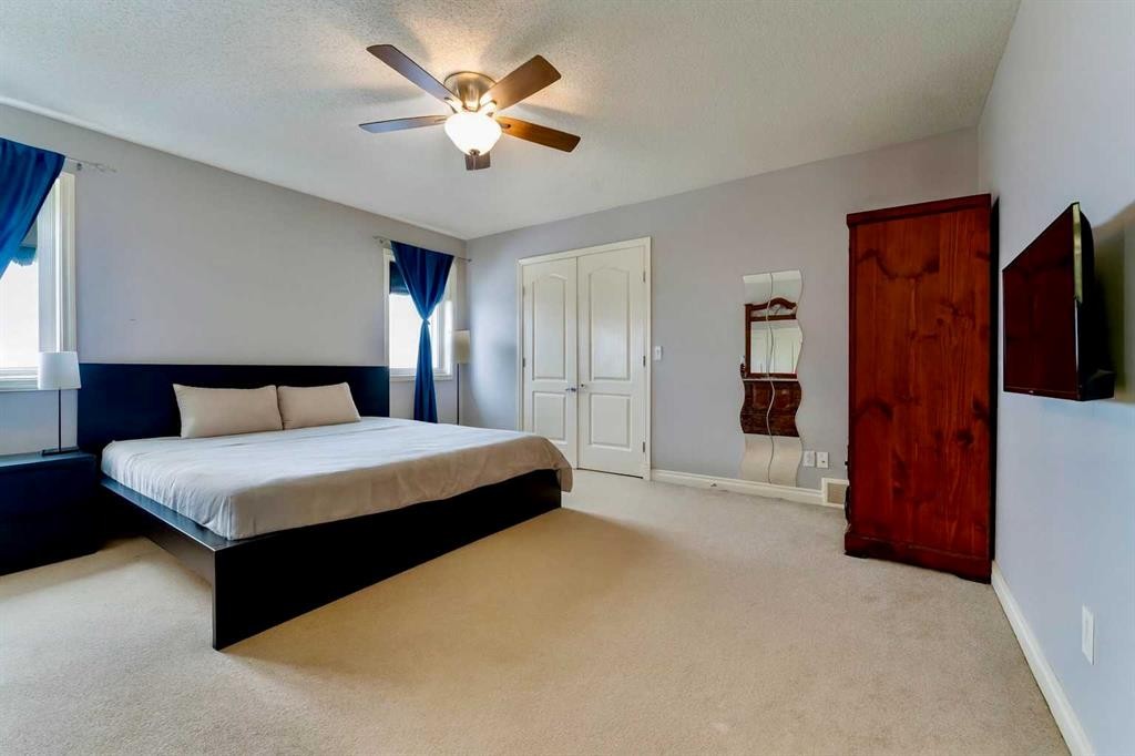 236 Willowmere Way, Chestermere, AB - Indoor Photo Showing Bedroom