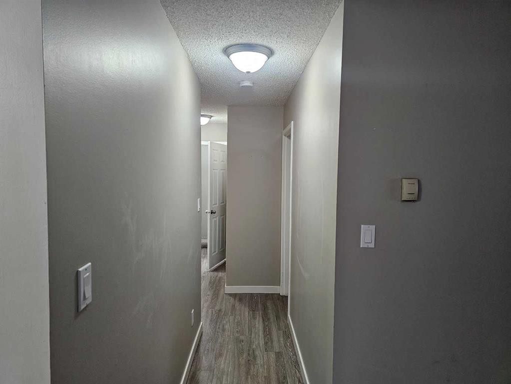 105-5812 61 Street, Red Deer, AB - Indoor Photo Showing Other Room