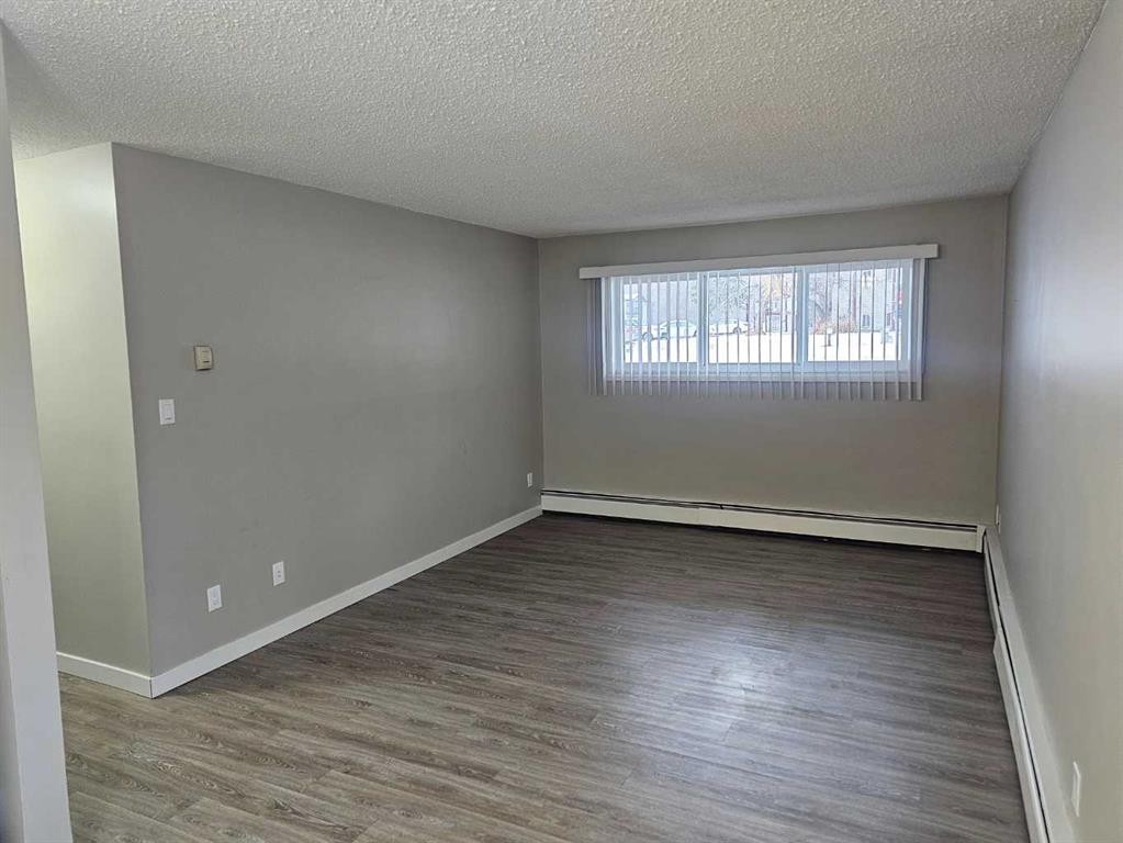 105-5812 61 Street, Red Deer, AB - Indoor Photo Showing Other Room
