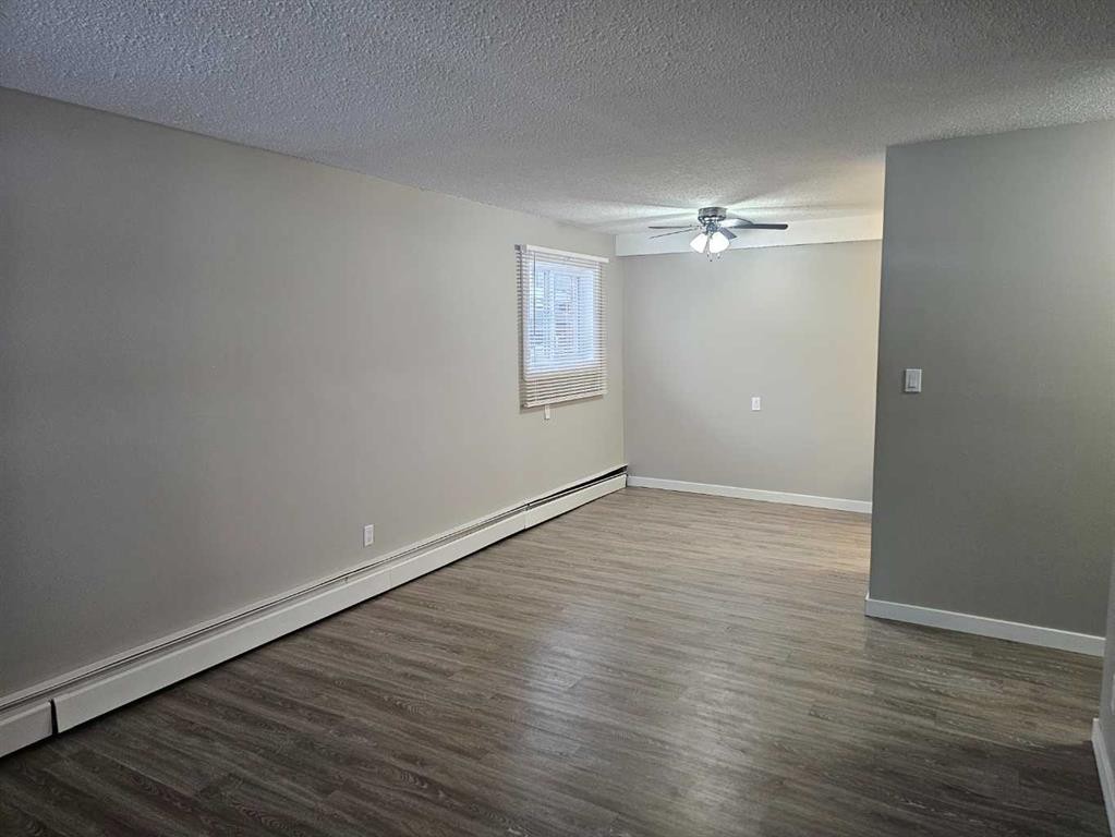 105-5812 61 Street, Red Deer, AB - Indoor Photo Showing Other Room