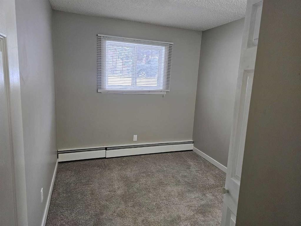 105-5812 61 Street, Red Deer, AB - Indoor Photo Showing Other Room