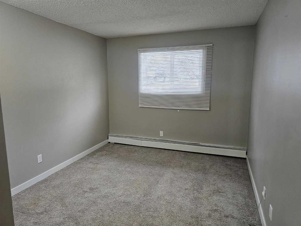 105-5812 61 Street, Red Deer, AB - Indoor Photo Showing Other Room