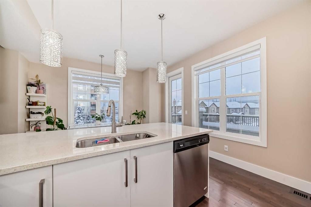 4 Quarry Lane Se, Calgary, AB - Indoor Photo Showing Kitchen With Double Sink