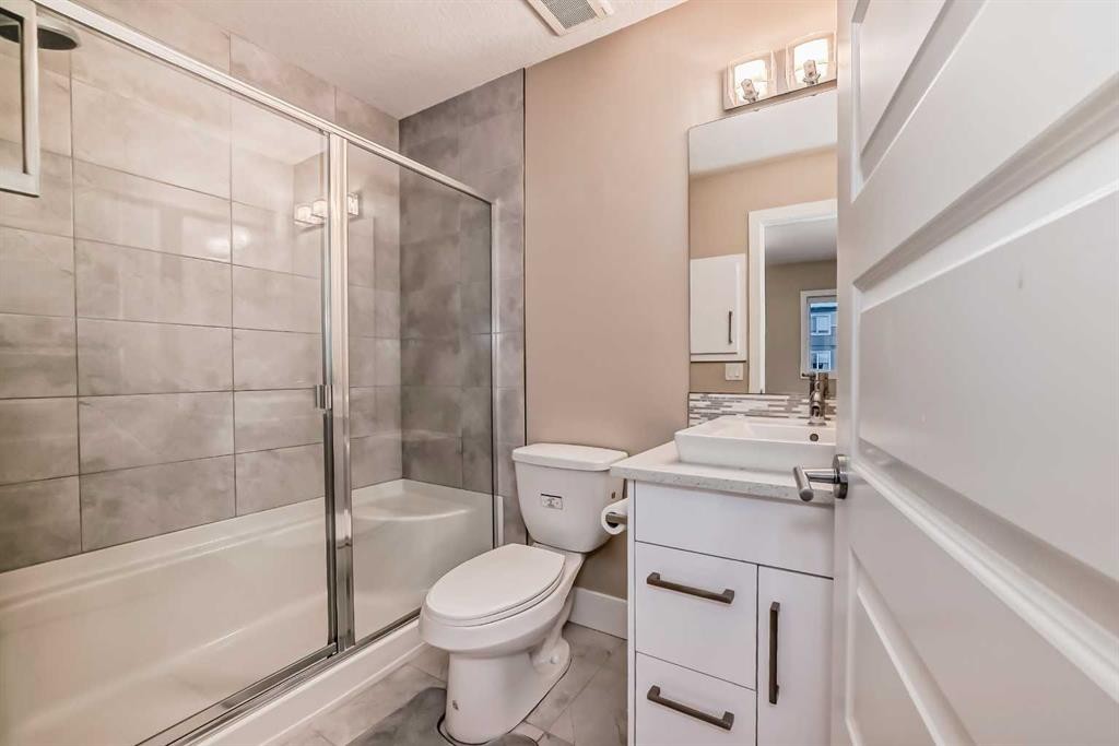 4 Quarry Lane Se, Calgary, AB - Indoor Photo Showing Bathroom