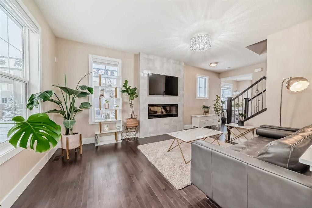 4 Quarry Lane Se, Calgary, AB - Indoor Photo Showing Living Room With Fireplace