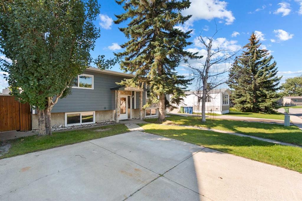 125 Big Springs Drive, Airdrie, AB - Outdoor With Facade