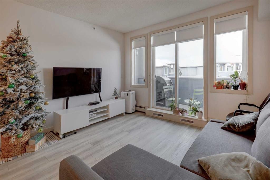 402-120 Country Village Circle Ne, Calgary, AB - Indoor Photo Showing Living Room