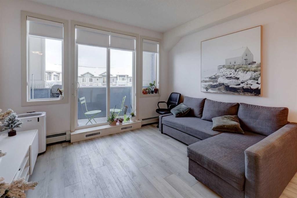402-120 Country Village Circle Ne, Calgary, AB - Indoor Photo Showing Living Room