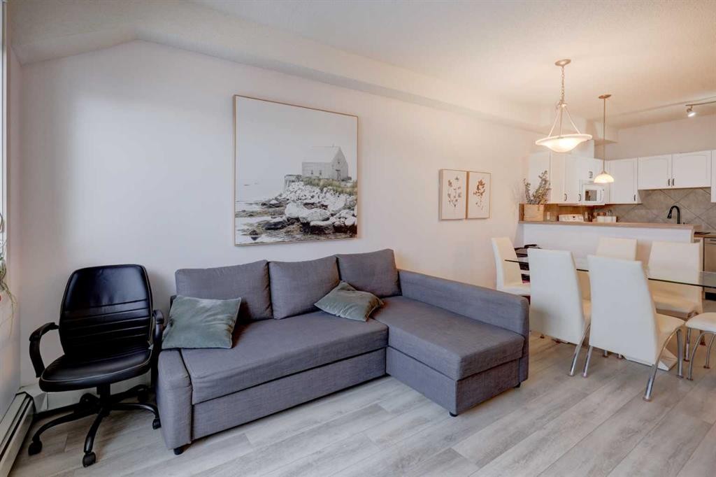 402-120 Country Village Circle Ne, Calgary, AB - Indoor Photo Showing Living Room