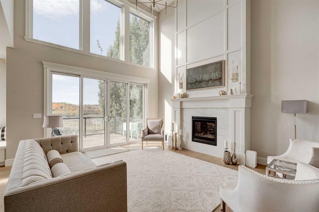 147 Legacy Mount Se, Calgary, AB - Indoor Photo Showing Living Room With Fireplace