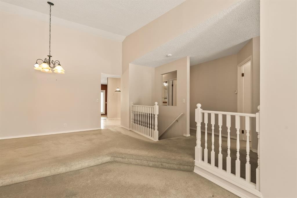 716 Coach Bluff Crescent Sw, Calgary, AB - Indoor Photo Showing Other Room