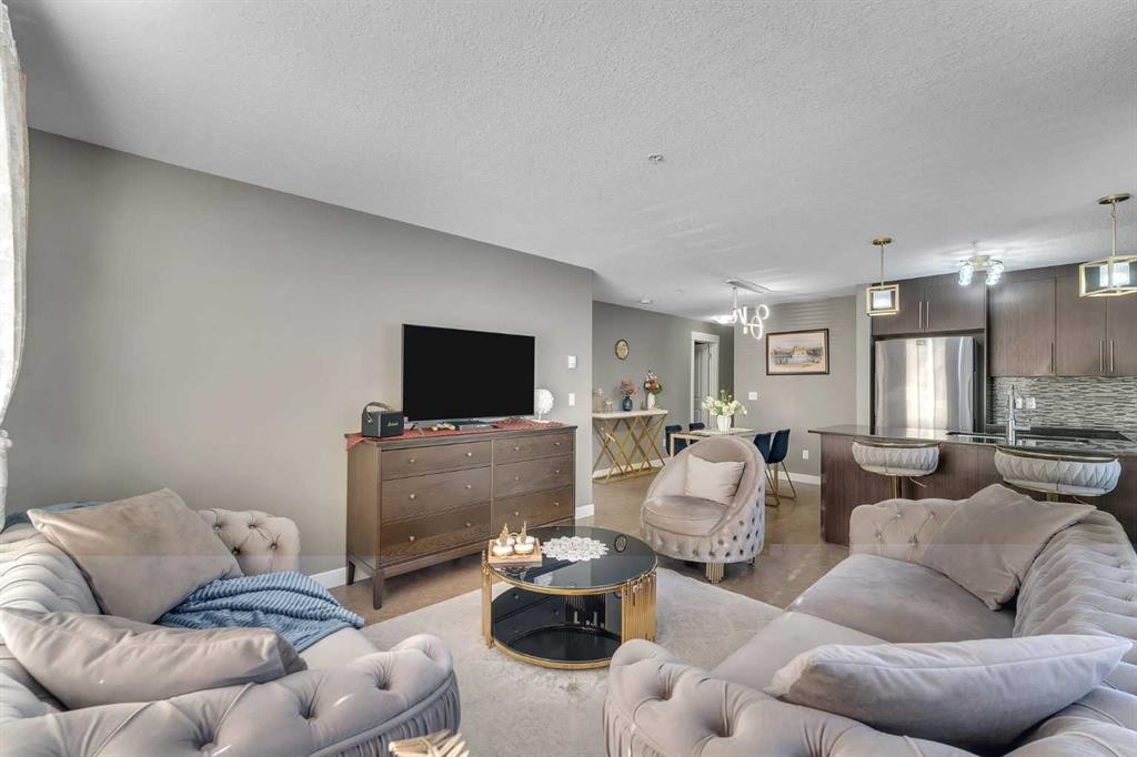 4209-155 Skyview Ranch Way Ne, Calgary, AB - Indoor Photo Showing Living Room