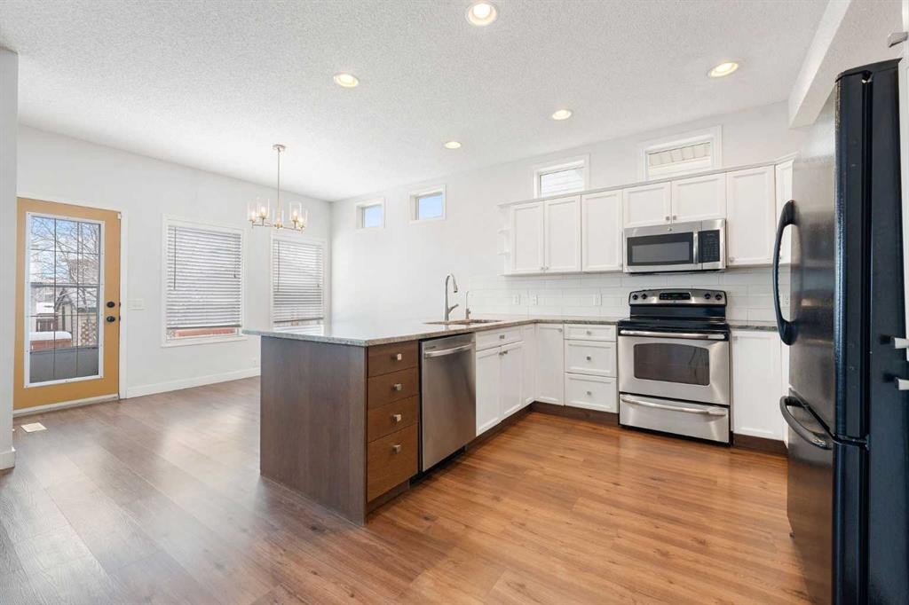 283 Prestwick Landing Se, Calgary, AB - Indoor Photo Showing Kitchen With Stainless Steel Kitchen With Upgraded Kitchen