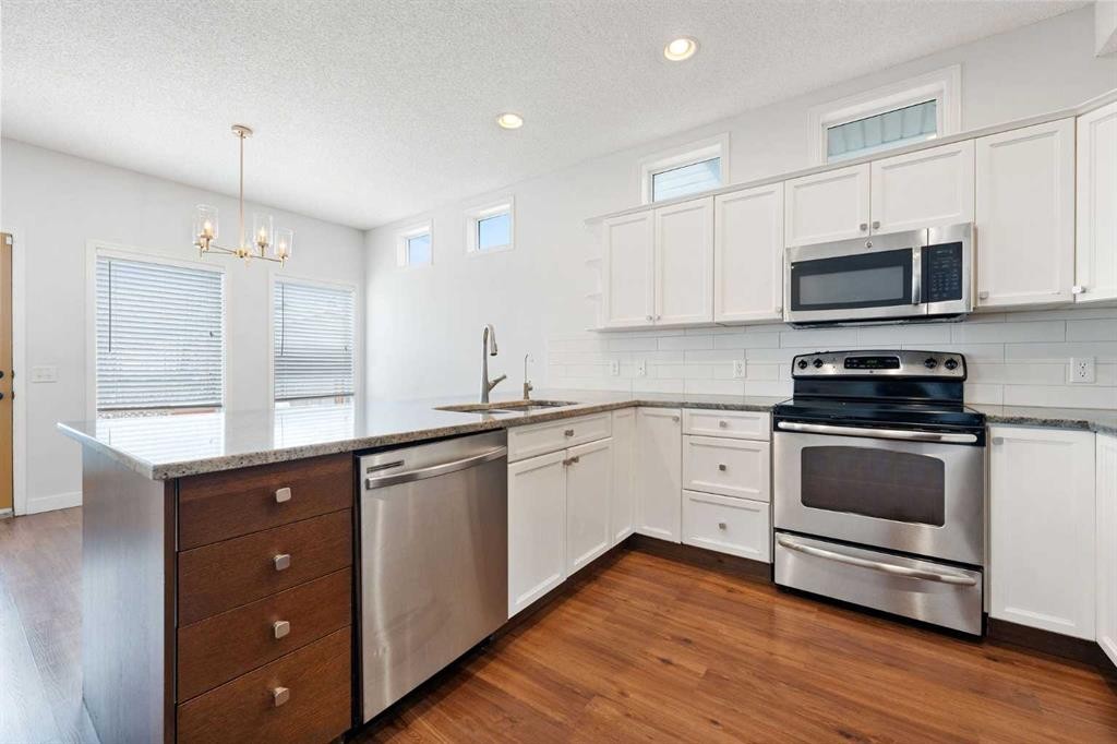 283 Prestwick Landing Se, Calgary, AB - Indoor Photo Showing Kitchen With Stainless Steel Kitchen