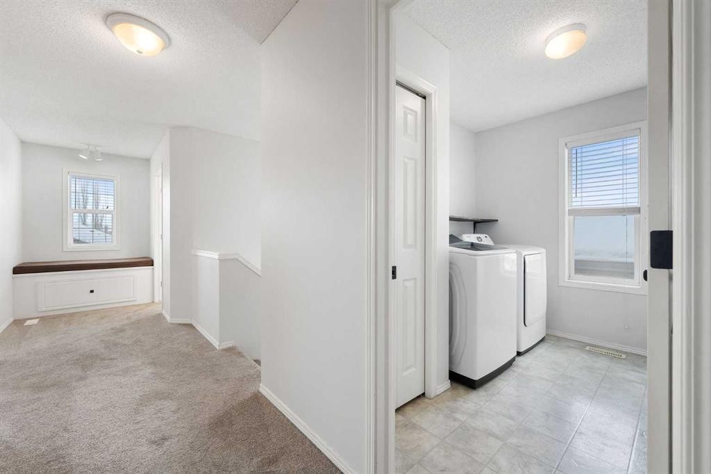283 Prestwick Landing Se, Calgary, AB - Indoor Photo Showing Laundry Room