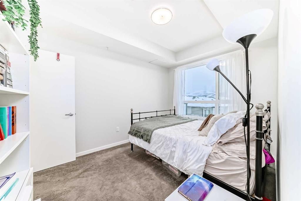 2401-42 Cranbrook Gardens Se, Calgary, AB - Indoor Photo Showing Bedroom