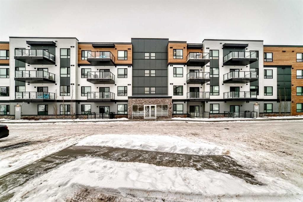 2401-42 Cranbrook Gardens Se, Calgary, AB - Outdoor With Balcony With Facade