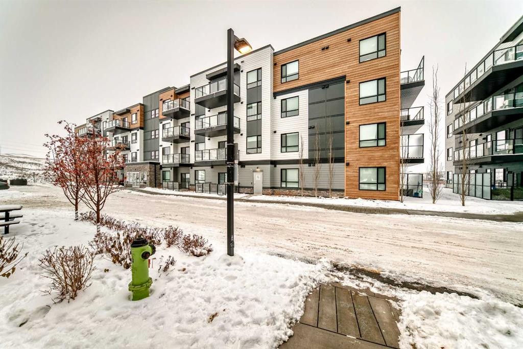 2401-42 Cranbrook Gardens Se, Calgary, AB - Outdoor With Balcony With Facade