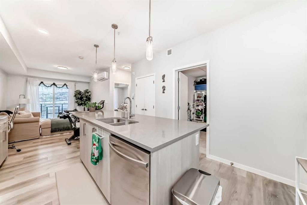 2401-42 Cranbrook Gardens Se, Calgary, AB - Indoor Photo Showing Kitchen With Double Sink With Upgraded Kitchen