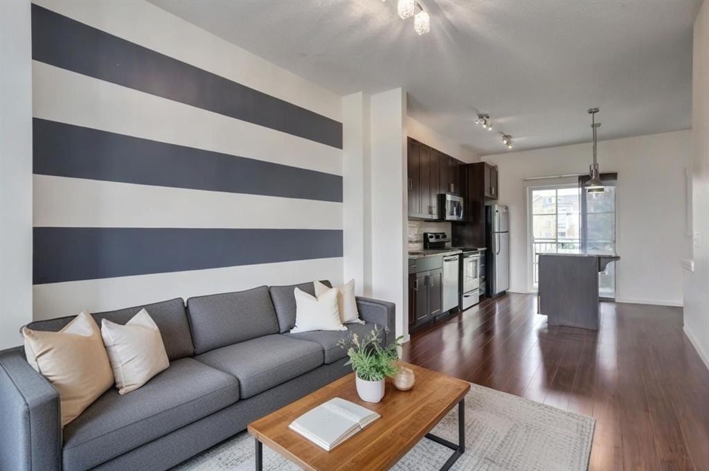 215 Copperpond Common Se, Calgary, AB - Indoor Photo Showing Living Room