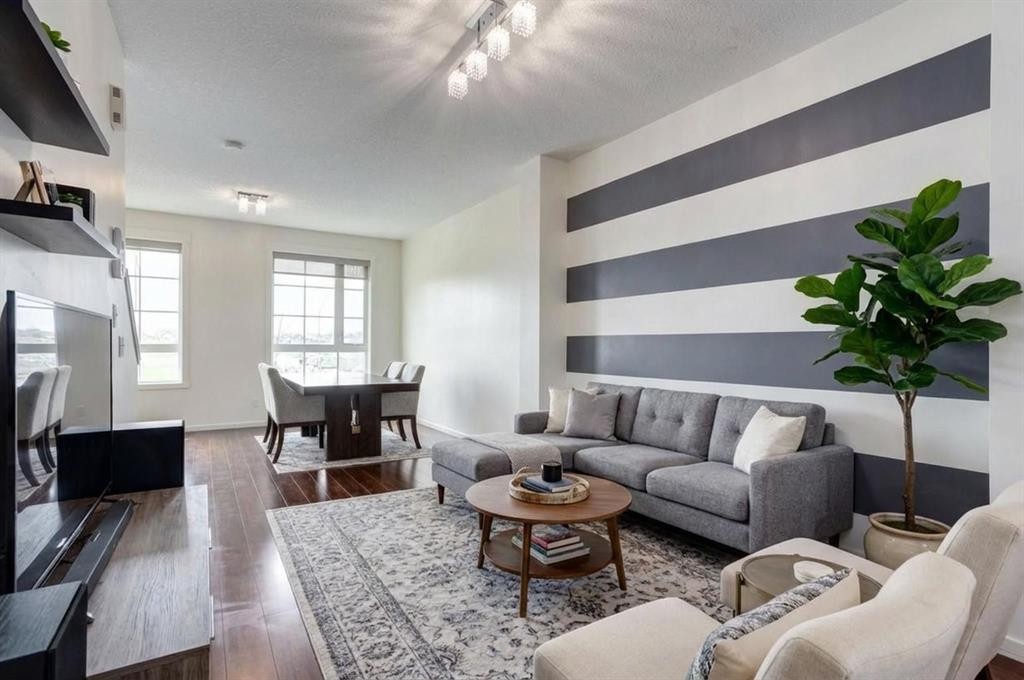 215 Copperpond Common Se, Calgary, AB - Indoor Photo Showing Living Room