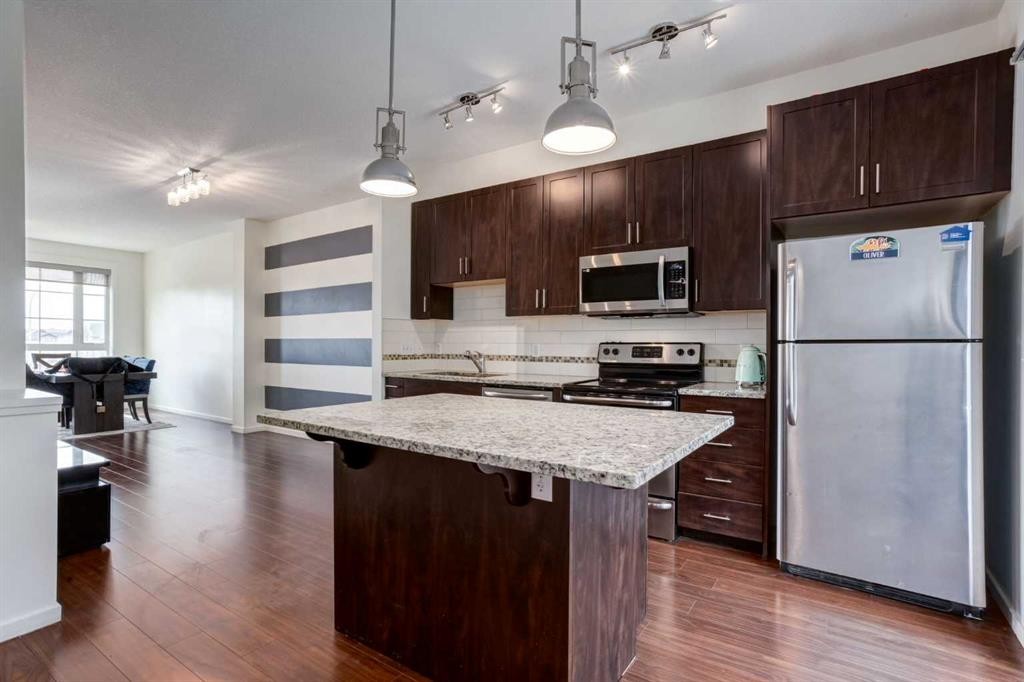 215 Copperpond Common Se, Calgary, AB - Indoor Photo Showing Kitchen With Stainless Steel Kitchen With Upgraded Kitchen