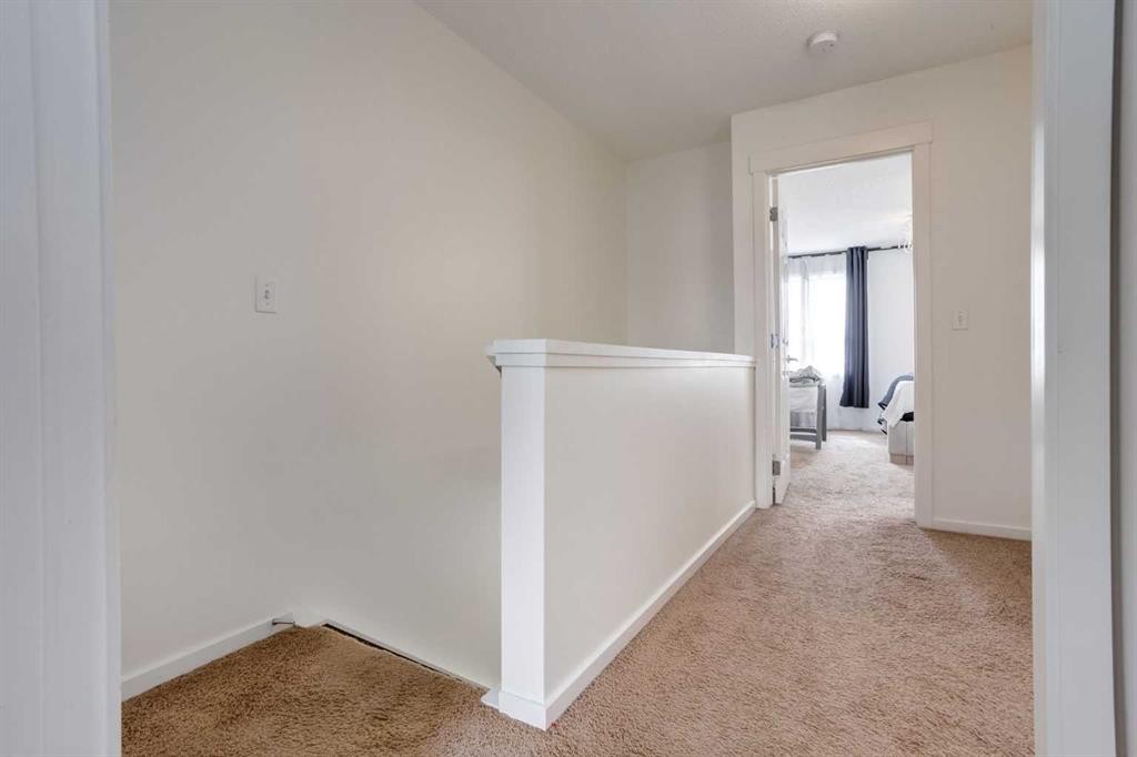 215 Copperpond Common Se, Calgary, AB - Indoor Photo Showing Other Room