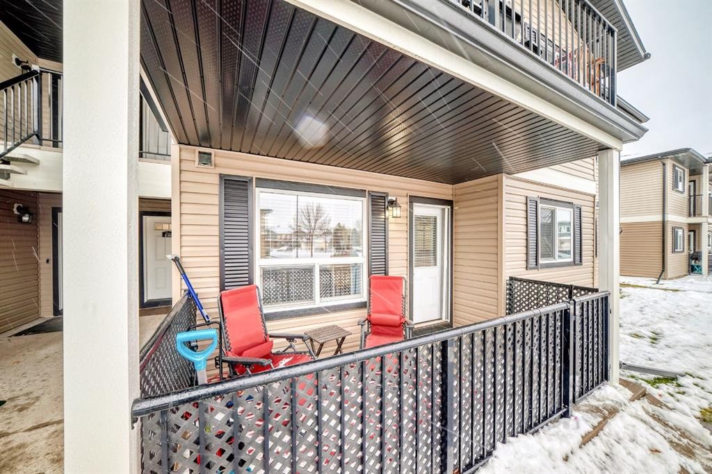 200-8 Bayside Place, Strathmore, AB - Outdoor With Deck Patio Veranda With Exterior