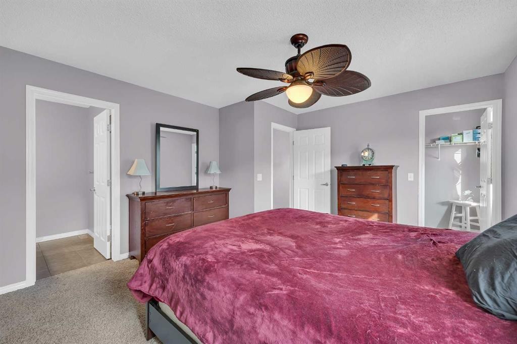 126 Windstone Avenue Sw, Airdrie, AB - Indoor Photo Showing Bedroom
