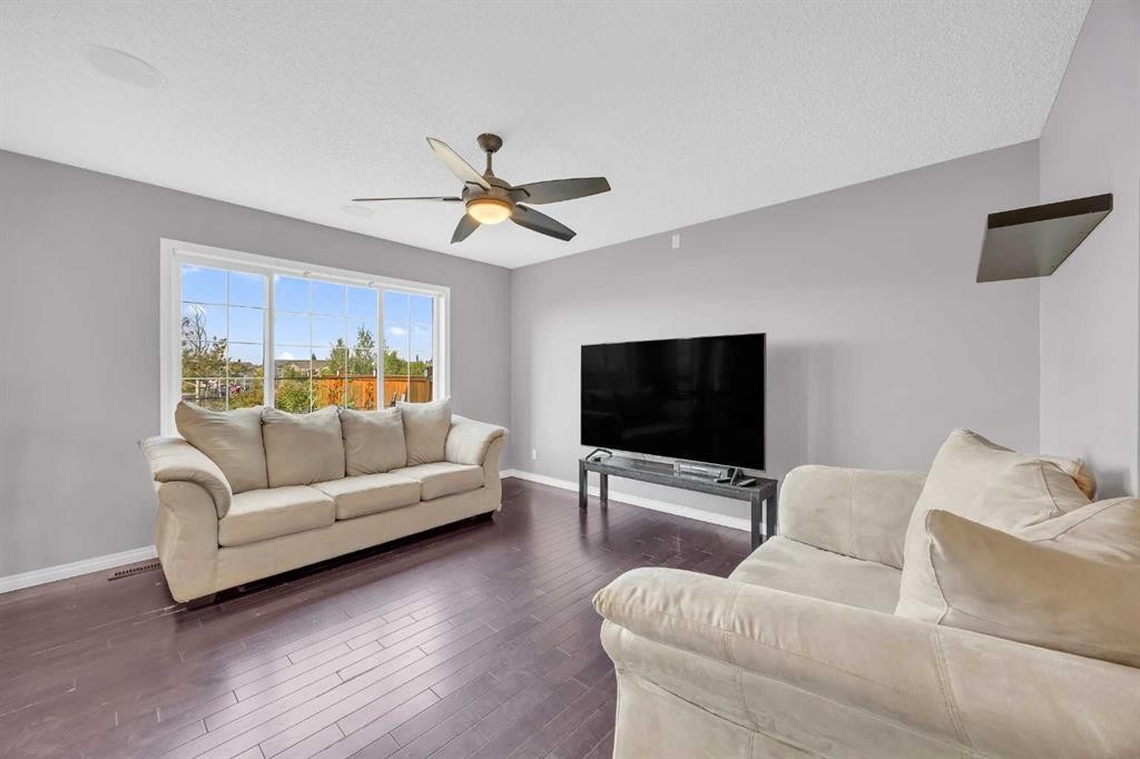126 Windstone Avenue Sw, Airdrie, AB - Indoor Photo Showing Living Room