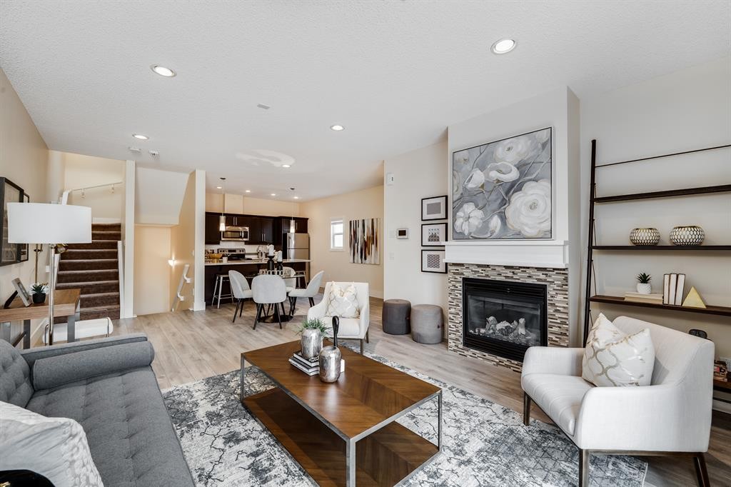 2-2008 12 Avenue Sw, Calgary, AB - Indoor Photo Showing Living Room With Fireplace