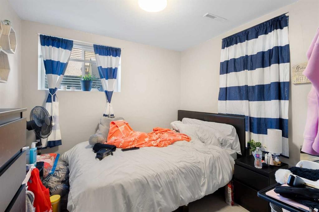 4612 Fortune Road Se, Calgary, AB - Indoor Photo Showing Bedroom