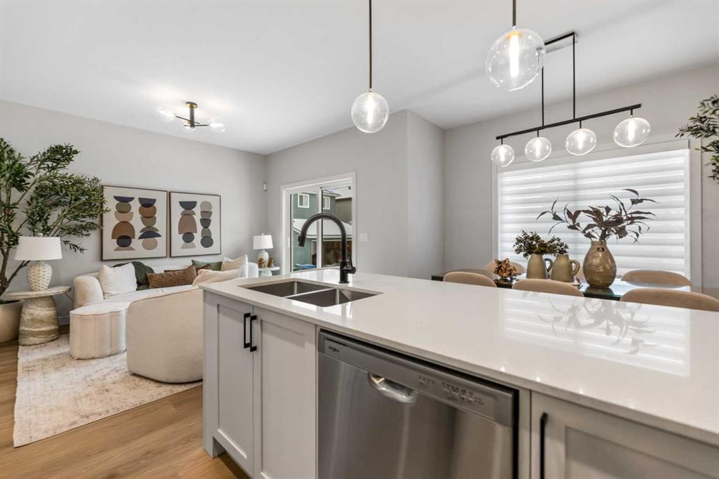 241 Waterford Heath, Chestermere, AB - Indoor Photo Showing Kitchen With Double Sink