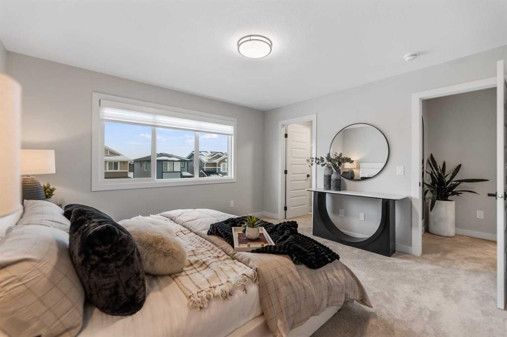 241 Waterford Heath, Chestermere, AB - Indoor Photo Showing Bedroom