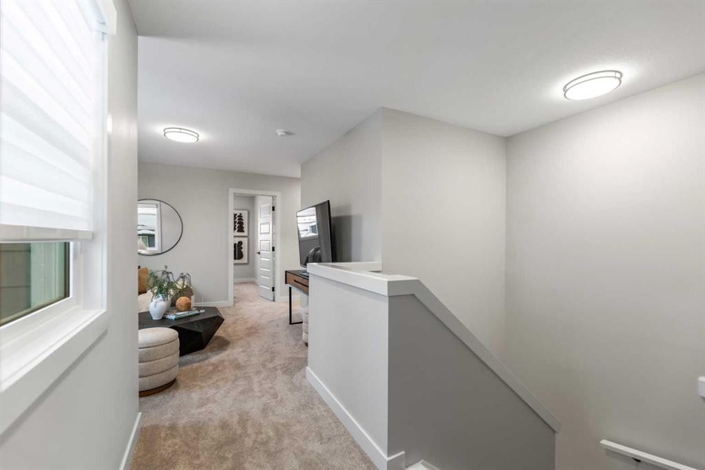 241 Waterford Heath, Chestermere, AB - Indoor Photo Showing Other Room