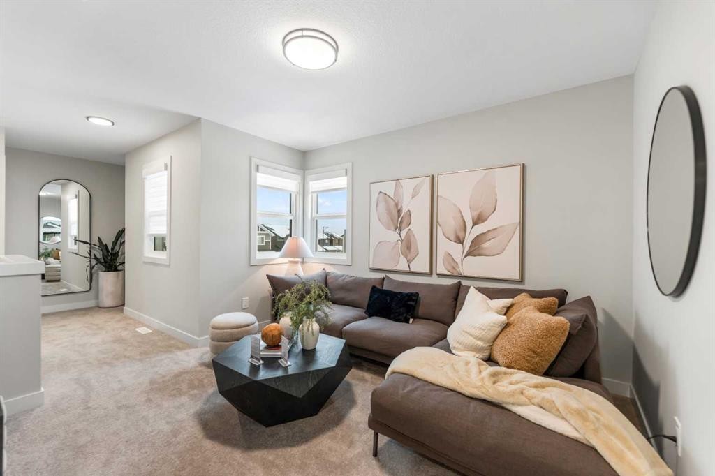 241 Waterford Heath, Chestermere, AB - Indoor Photo Showing Living Room