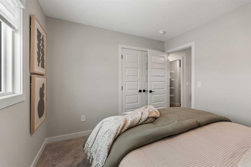 241 Waterford Heath, Chestermere, AB - Indoor Photo Showing Bedroom