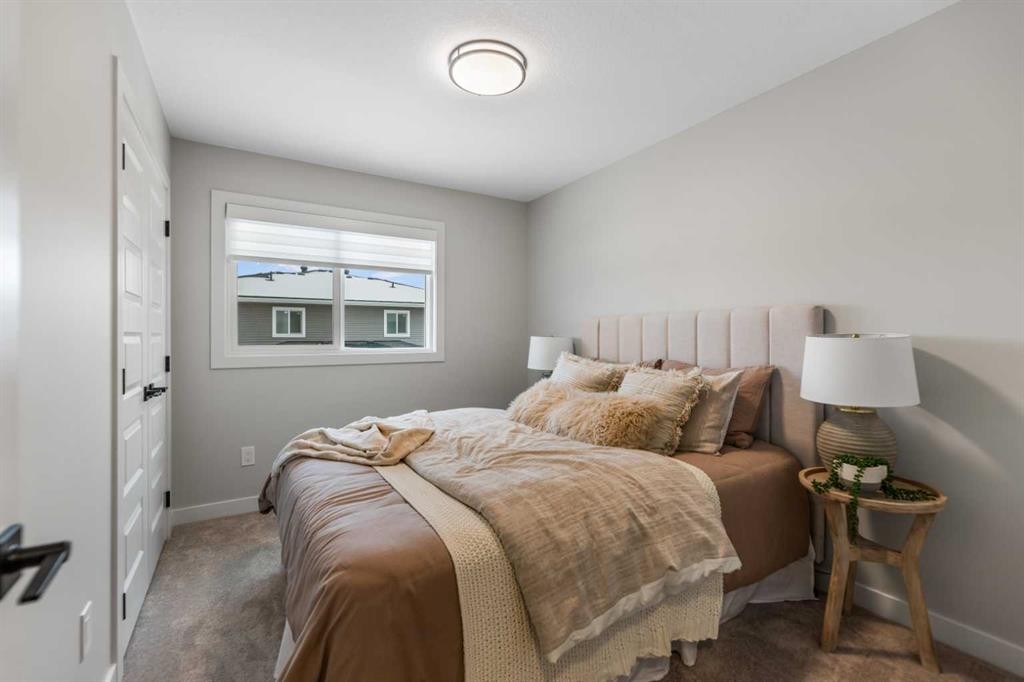 241 Waterford Heath, Chestermere, AB - Indoor Photo Showing Bedroom