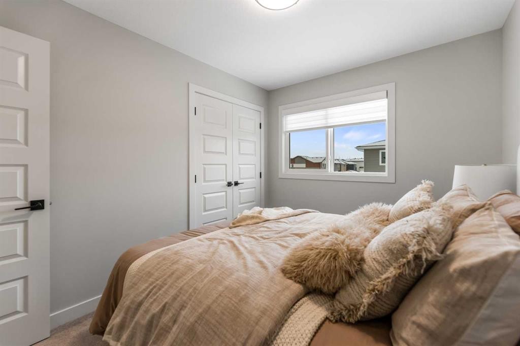 241 Waterford Heath, Chestermere, AB - Indoor Photo Showing Bedroom