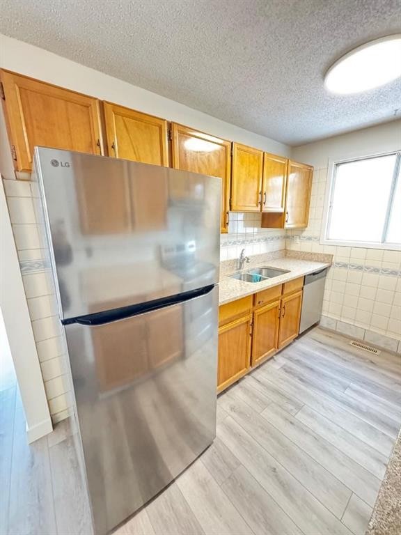 6879 Rundlehorn Drive Ne, Calgary, AB - Indoor Photo Showing Kitchen With Double Sink
