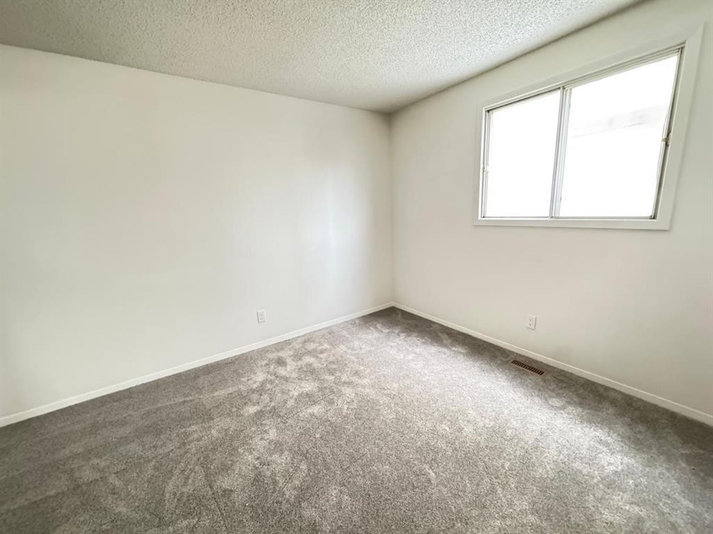 6879 Rundlehorn Drive Ne, Calgary, AB - Indoor Photo Showing Other Room