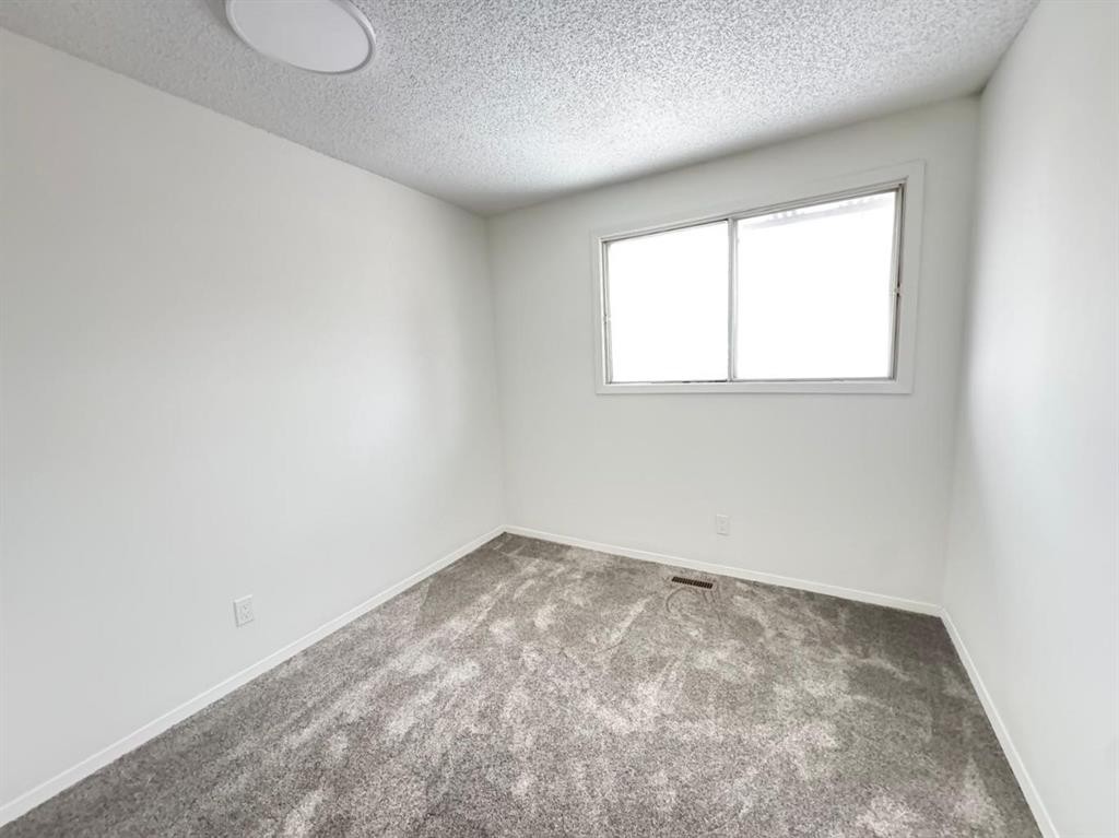 6879 Rundlehorn Drive Ne, Calgary, AB - Indoor Photo Showing Other Room
