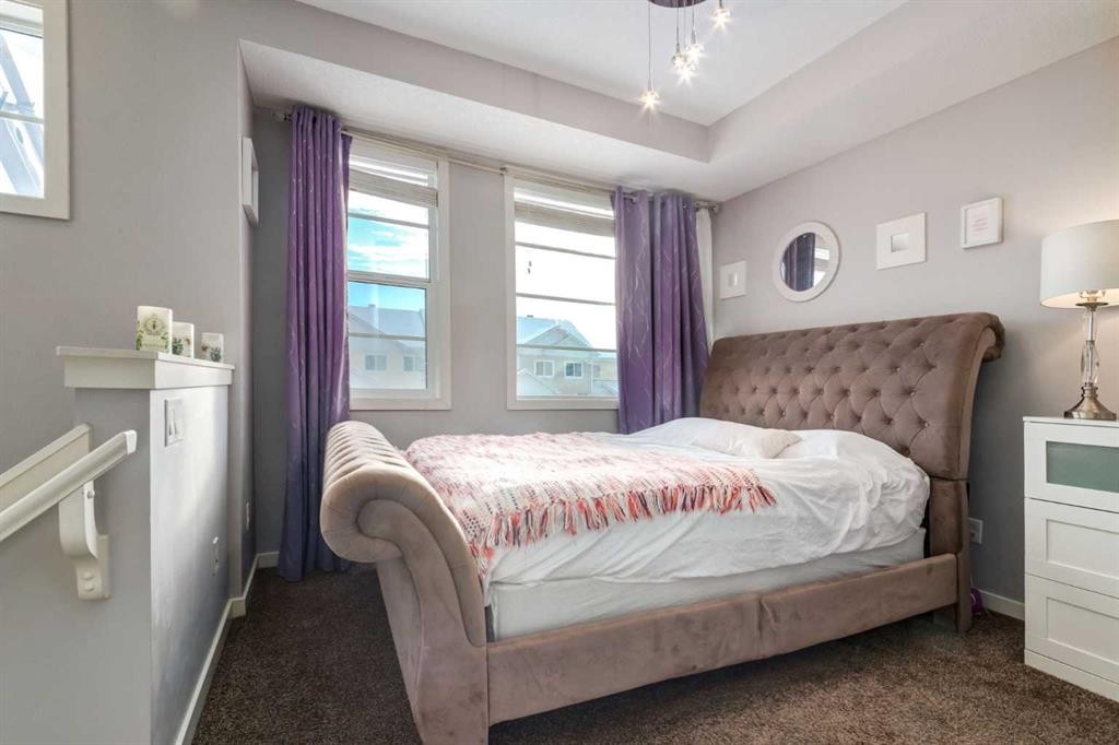 415 Saddlemont Boulevard Ne, Calgary, AB - Indoor Photo Showing Bedroom
